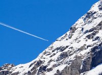 Vapour trail over the Eiger