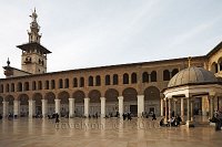 Syria-Damascus-the-courtyard-and-the-dome-of-the-clocks-and-the-minaret-of-the-bride-in-the-Great-Umayyad-mosque