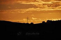 Dorset sunset with pylons 2